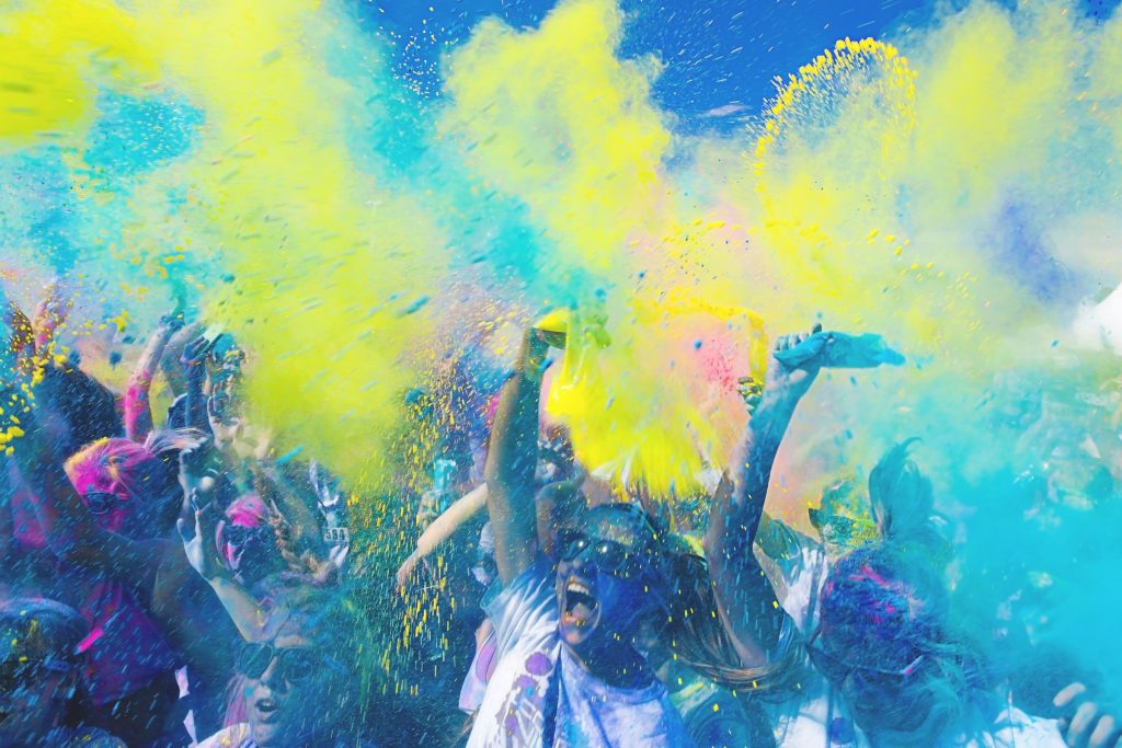 Outdoor party with lots of powder paint